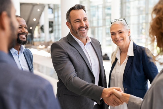 Business people shaking hands after a meeting