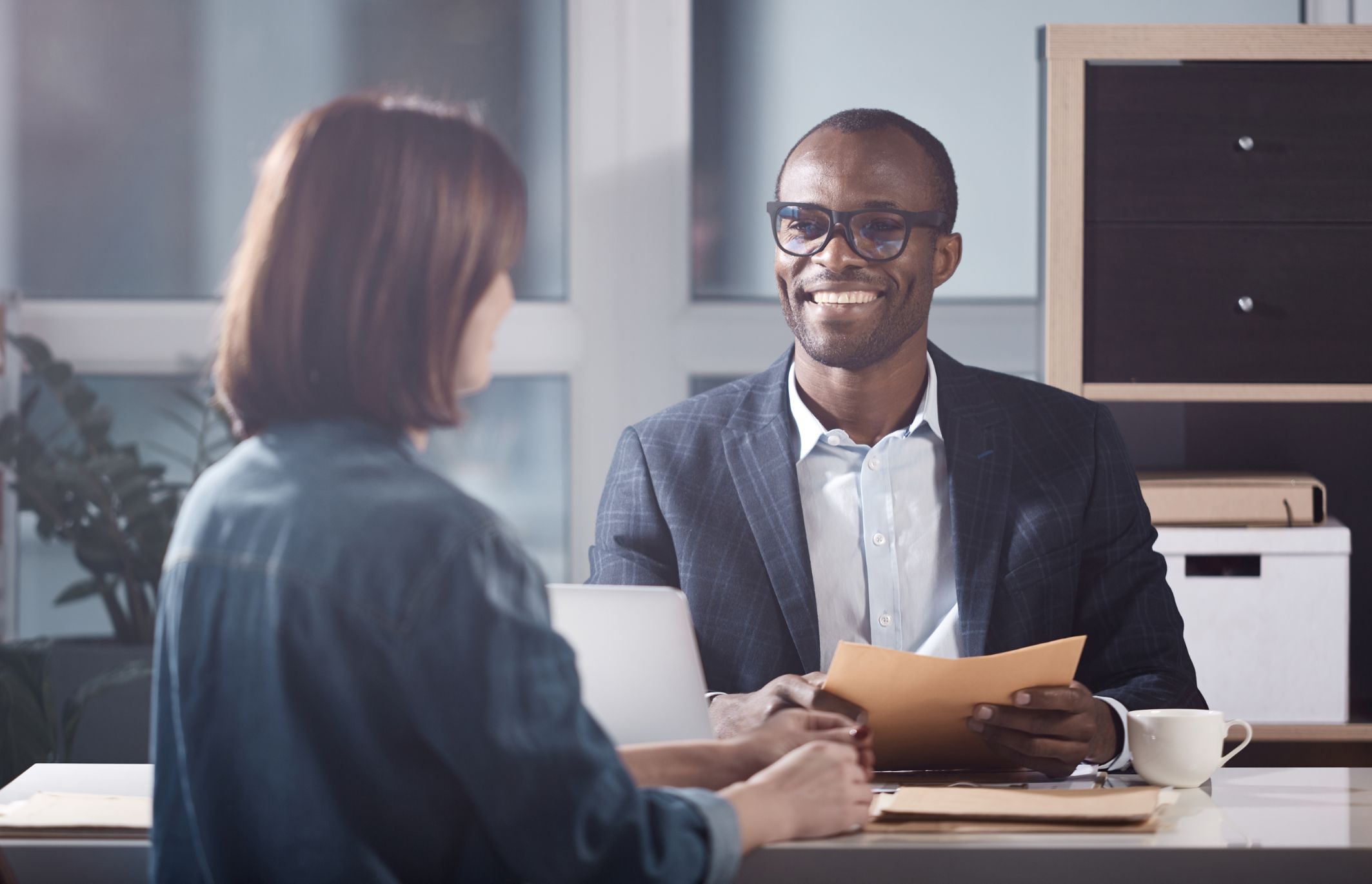 Man interviewing for a briefing professionals job