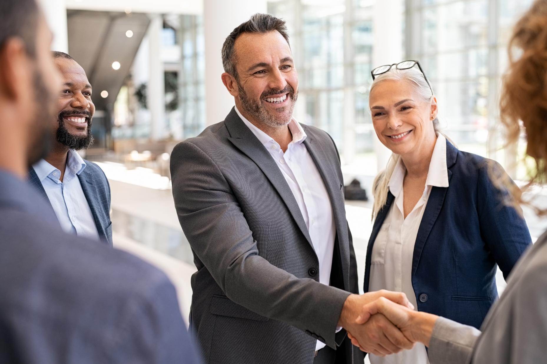Business people shaking hands after a meeting