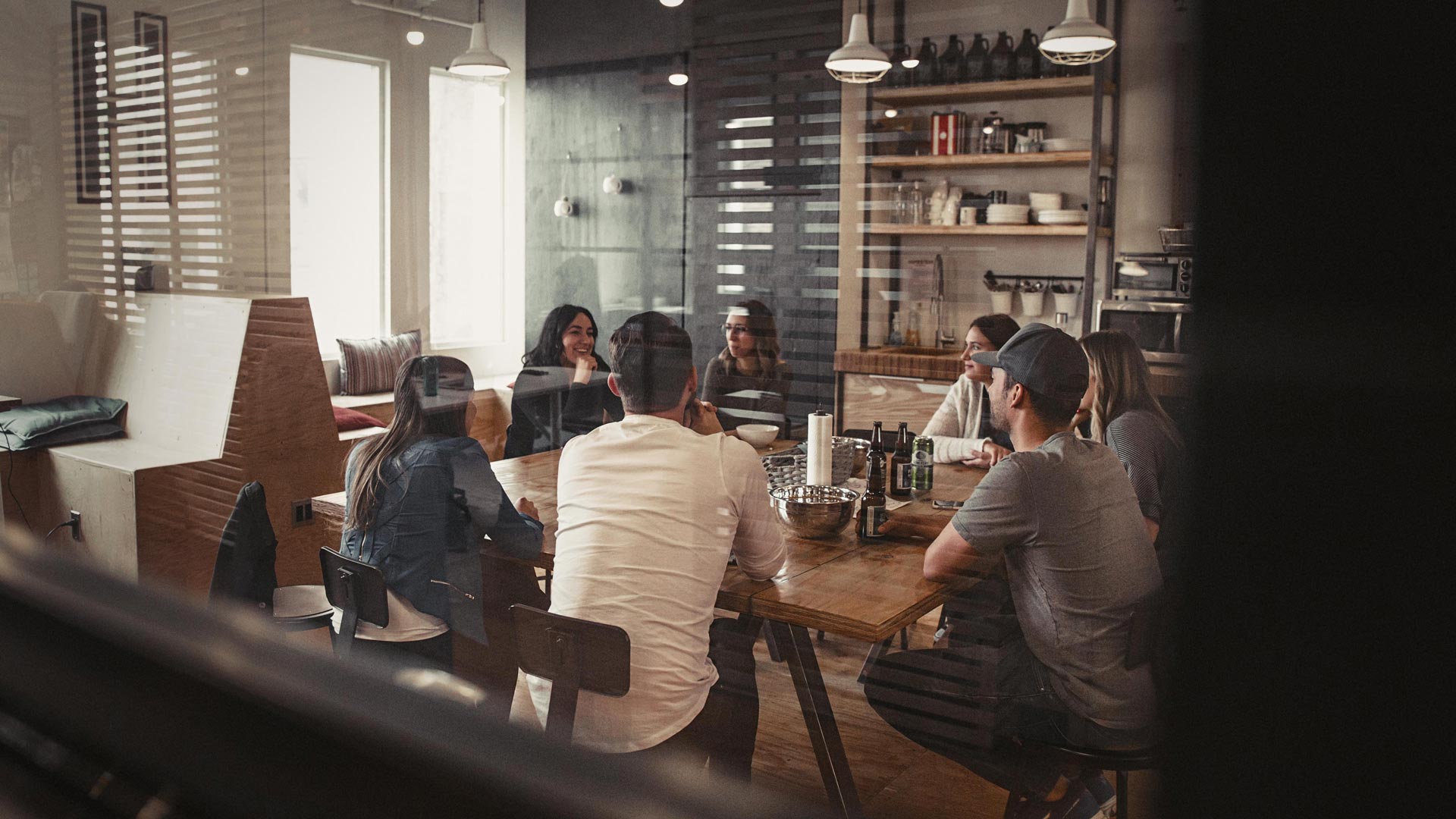 Consulting session with group of young executives sitting around a table